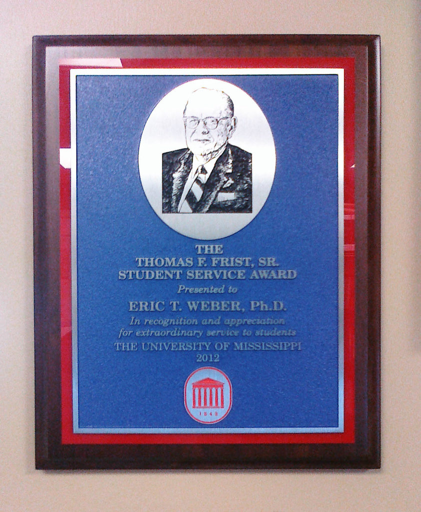Photo of the plaque that I received from the university for the award.