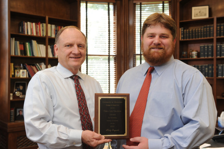 Dean Glenn Hopkins and Weber, receiving the Cora Lee Graham Award for Teaching.