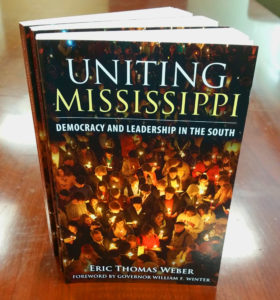 Paperback editions featuring the cover of 'Uniting Mississippi.'